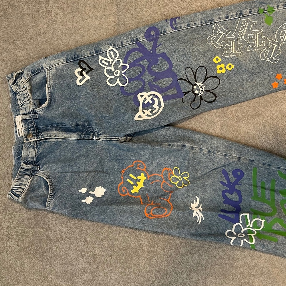 BERSHKA JEANS WITH GRAFFITI PRINT